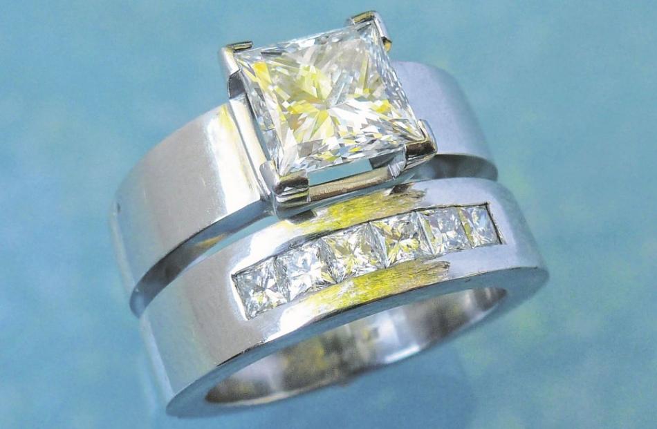Princess cut diamond set in platinum by Chris Idour.