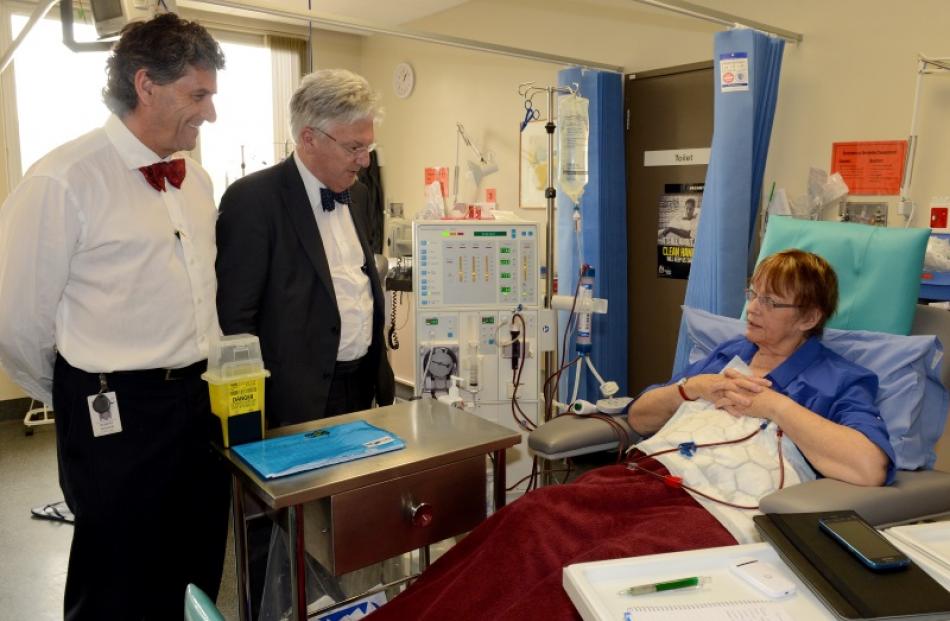 Prof Rob Walker (left) and Associate Health Minister Peter Dunne talk to dialysis patient Betty...