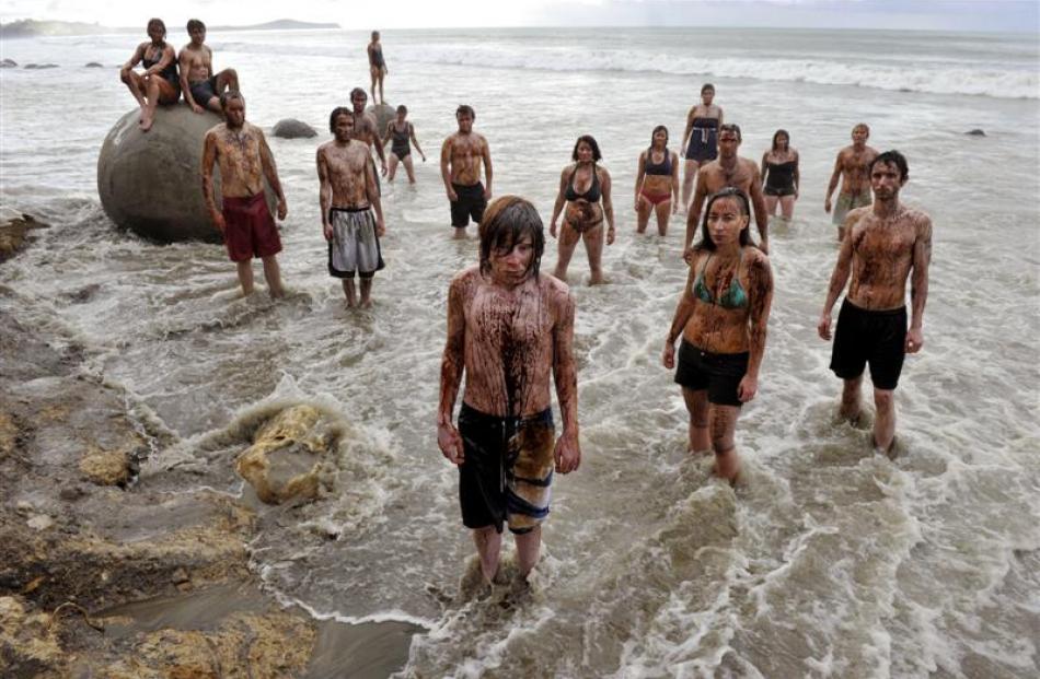 Protesters take part in an anti-oil exploration demonstration at Moeraki Beach yesterday,...