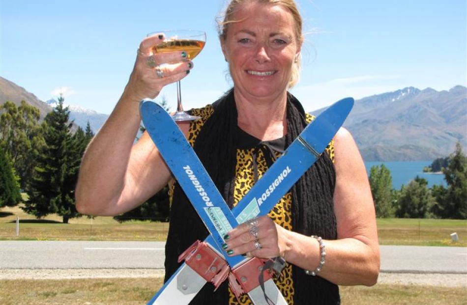 Proud mum Stacey Wells, of Wanaka, with the tiny skis her sons learned  on as toddlers. Sons ...