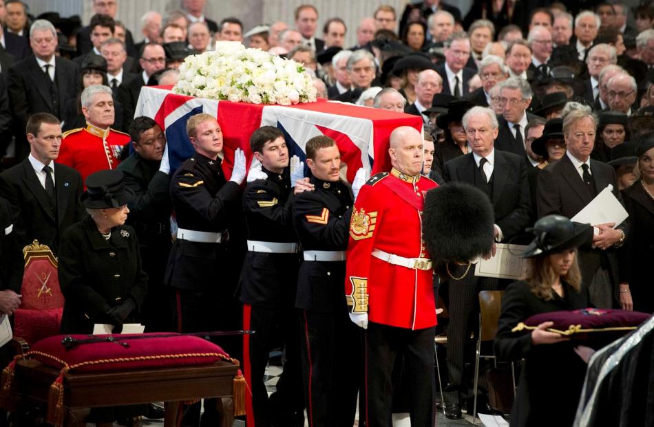 Queen Elizabeth (front L) and Mark Thatcher (R), son of former British prime minister Margaret...