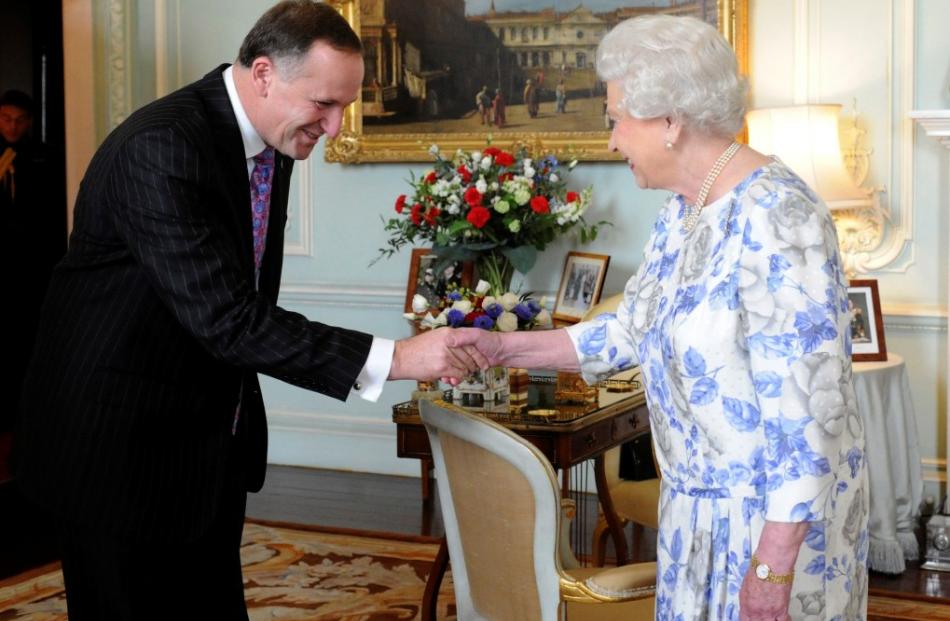 Queen Elizabeth meets New Zealand Prime Minister John Key at Buckingham Palace in London. REUTERS...