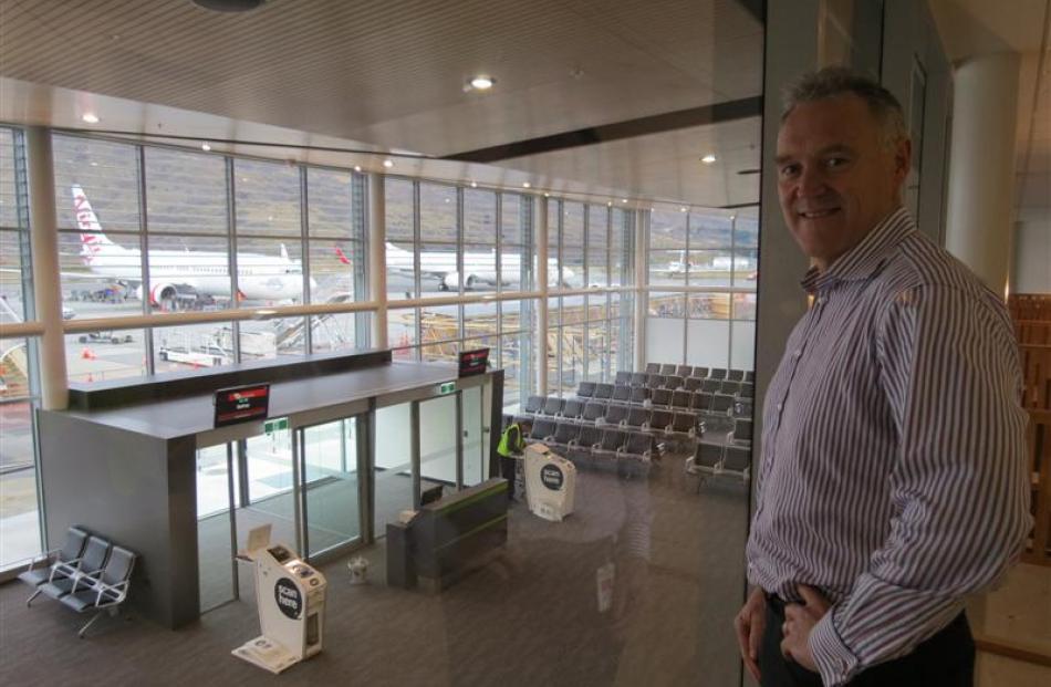 Queenstown Airport chief executive Scott Paterson looks over the international departure lounge...