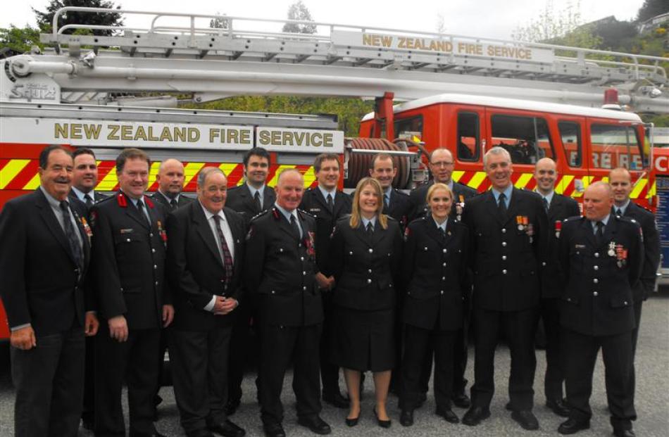 Queenstown and Frankton volunteer fire brigade award winners (rear, from  left) Bobby Lamont,...