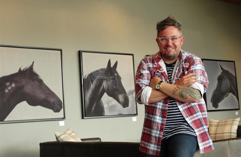 Queenstown artist Ben Jae with some of the pieces from his first fine art photography exhibition,...