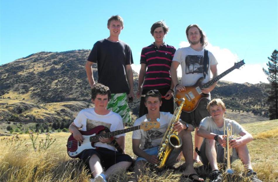 Queenstown band Dubside will open the  Gibbston Valley Winery concert on Saturday. From back left...