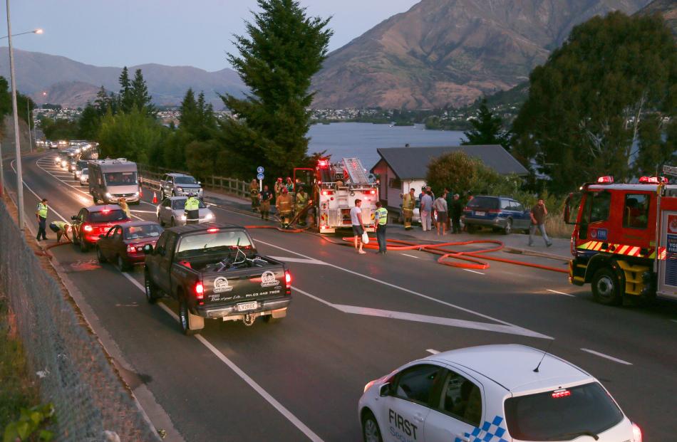 Queenstown's Frankton Rd was at a standstill as fire crews attended to a house fire last night....
