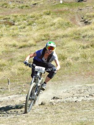 Queenstown's Harriet Latchem rides to the checkpoint marking the end of the first stage. Photos...