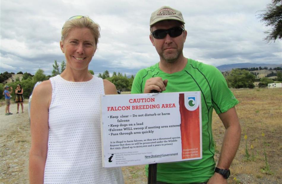 Rachel and Jamie Rankin with the warning signs they put up around the falcon nest at Albert Town...