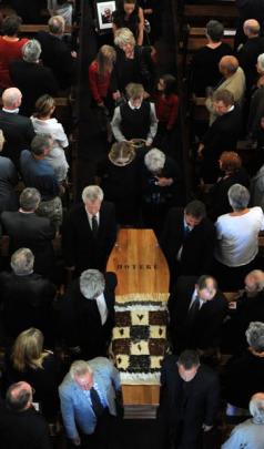 Ralph Hotere's widow, Mary McFarlane (left), and sister, Maraea Chung, follow his casket out of...