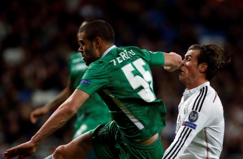 Real Madrid's Gareth Bale gets an elbow in the face from Ludogorets' Georgi Terziev. REUTERS...