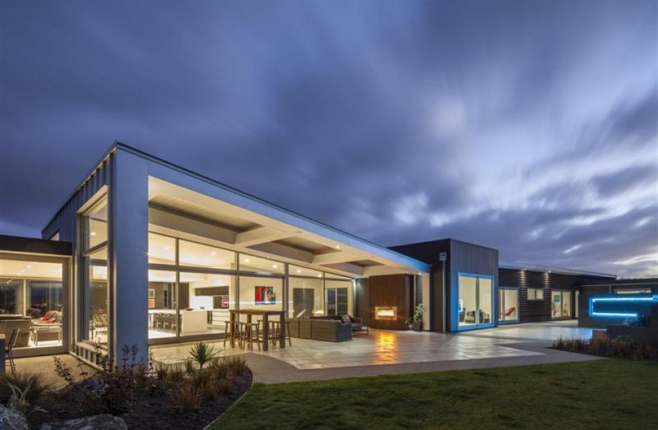Reece Warnock's design for the Ryan residence in Tirohanga Rd won the people's choice award in...