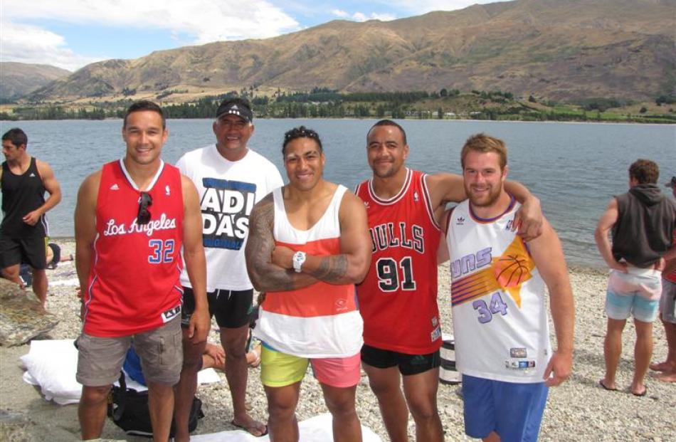 Relaxing at Eely Point  are (from left) Tamati Ellison, coach Jamie Joseph, Ma'a Nonu, Nasi Manu...