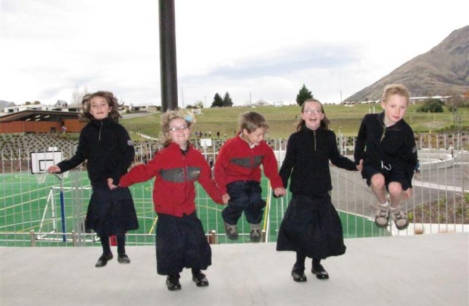 Remarkables Primary School pupils (from left) Lucy Norton (6), siblings Katya (9), Ethan (8), and...