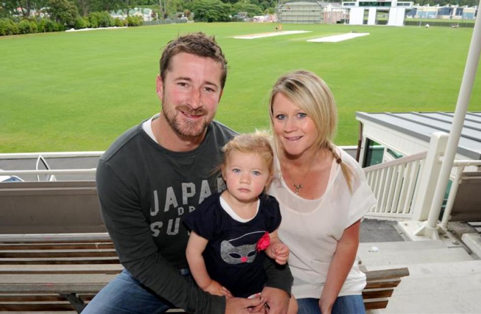 Retired Otago cricketer Warren McSkimming with wife, Jodie, and daughter, Ava (2), at the...