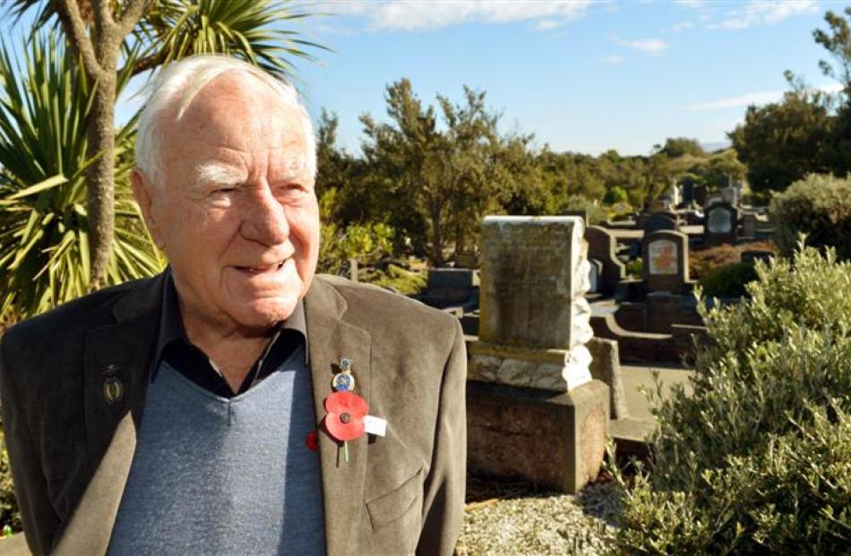 Returned soldier Dave Hanlin at Andersons Bay Cemetery where he will lay a poppy on his father's...