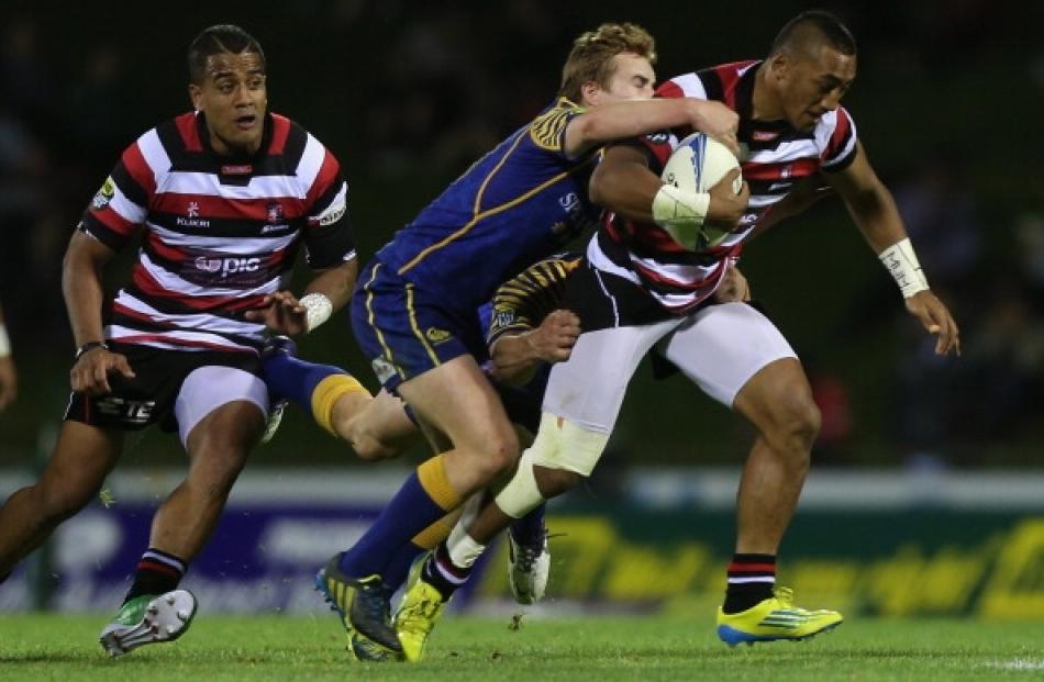 Rey Lee Lo of Counties Manukau is tackled during the ITM Cup Championship Final match between...