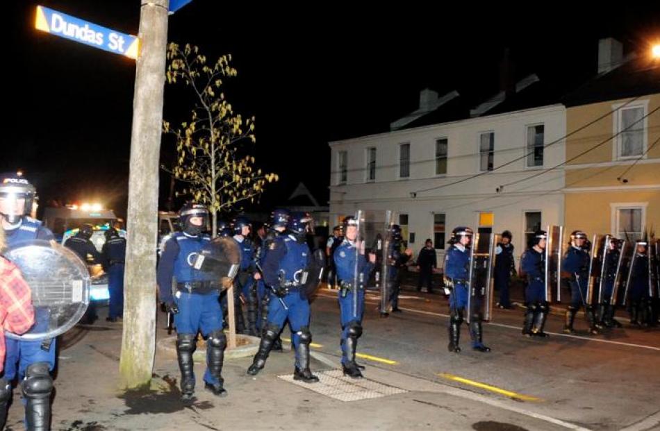 Riot police clash with students at the rogue Undie 500 event. Photo by Craig Baxter.