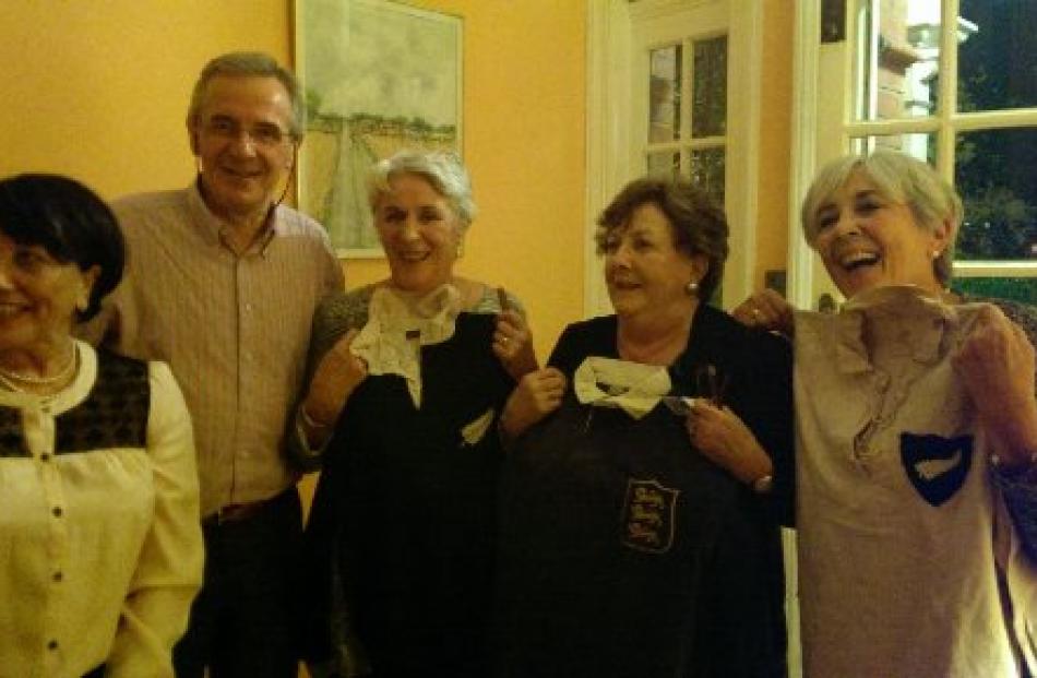 Robyn Opie (left) after returning the Lions jersey to Michael Dunne's adult children, Peter Dunne...