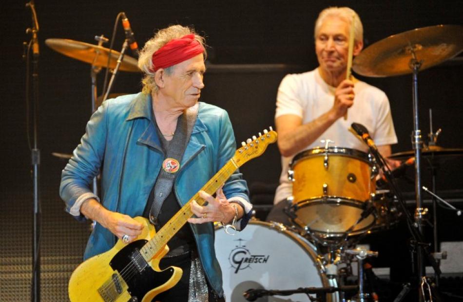 Rolling Stones Keith Richards (L) and Charlie Watts performs during the band's concert at the O2...