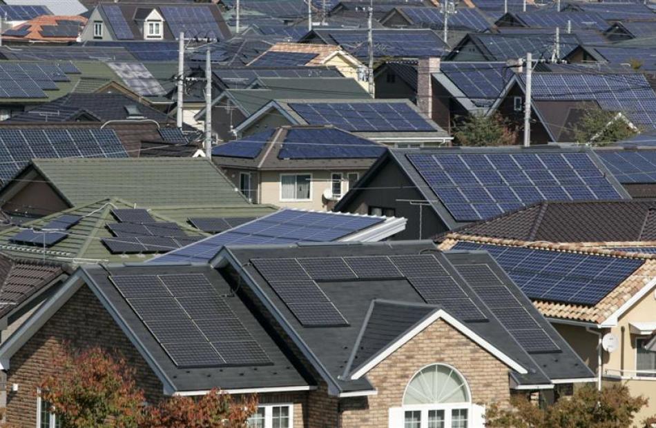 Rooftops of solar-powered houses in Ota, 80km northwest of Tokyo. Photo by Reuters.