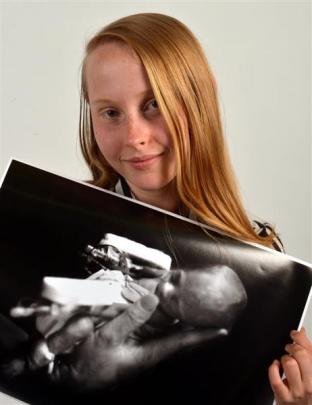 Rosa Flaherty, now 14, could fit in a nurse's hand soon after she was born at 24 weeks weighing...