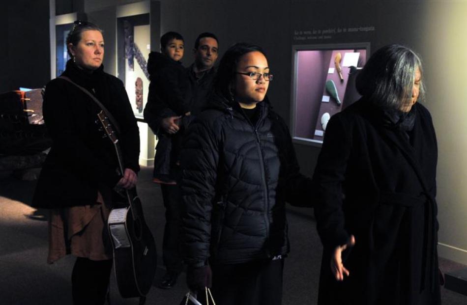 Rose Mohi (front right), of Hawkes Bay, leads Migoto Eria, the new curator Maori at the Otago...