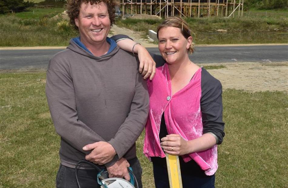Rowan Holt, pictured with husband Brendan on their building site last December, says many...