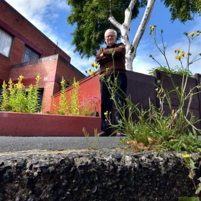 Roy Kenny is upset over what he claims is inaction by the Dunedin City Council in spraying weeds...