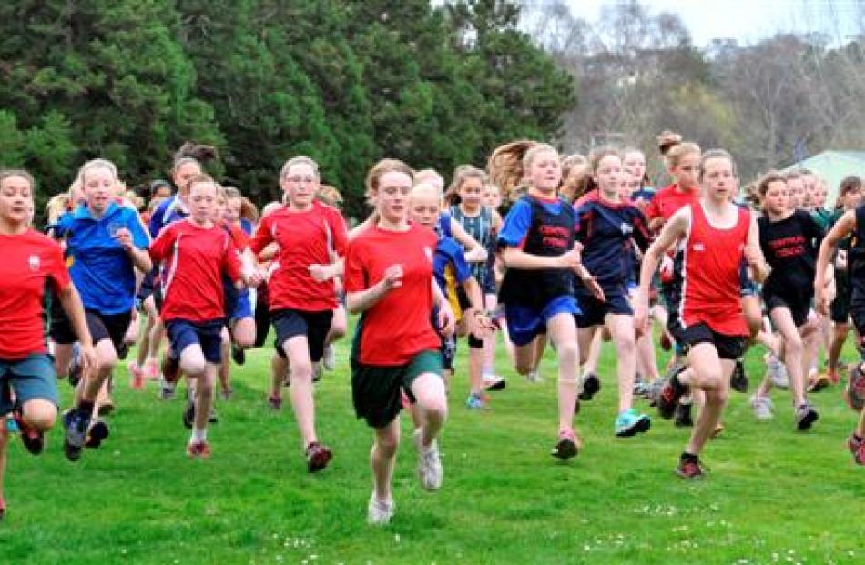 Runners jostle for position at the start of the girls year 7 race. Photos by Linda Robertson.