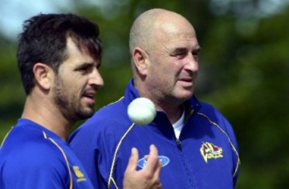 Ryan ten Doeschate, left, and coach Vaughn Johnson of the Otago Volts training at the University...