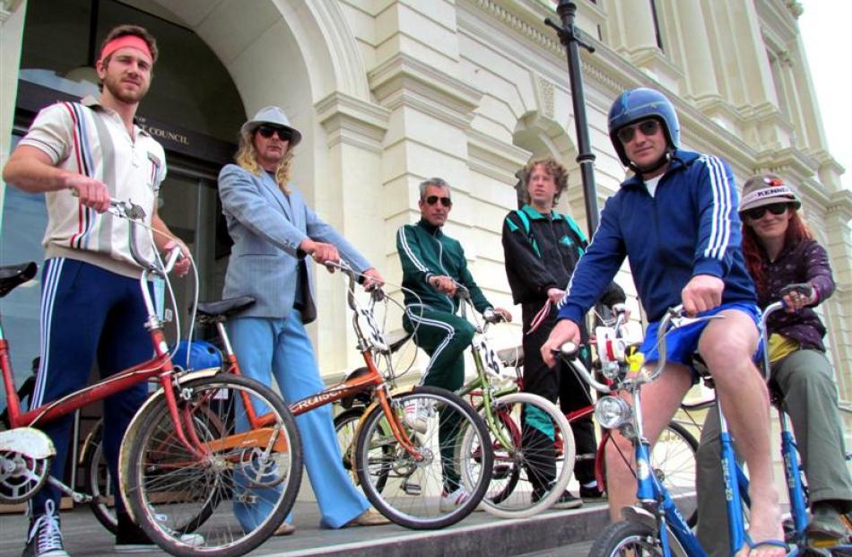 Safari Brothers Cycle Club members, back, from left,  Nick Lynch-Watson,   Mick Shuffler, Dave...