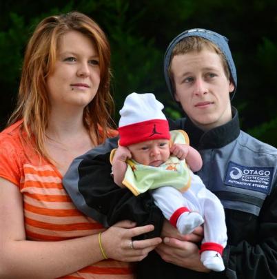 Sarah Lockerbie (20) and student Rhys Bell (22), pictured with  son Jai (1 month), accessed...