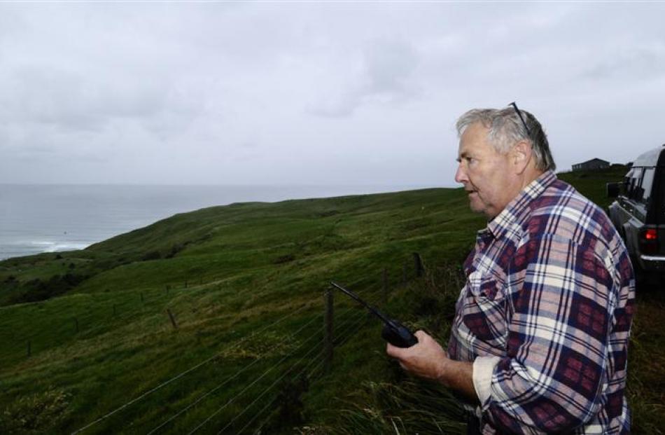 Senior Constable Lox Kellas, of Portobello, stays in radio contact with the Otago Regional Rescue...