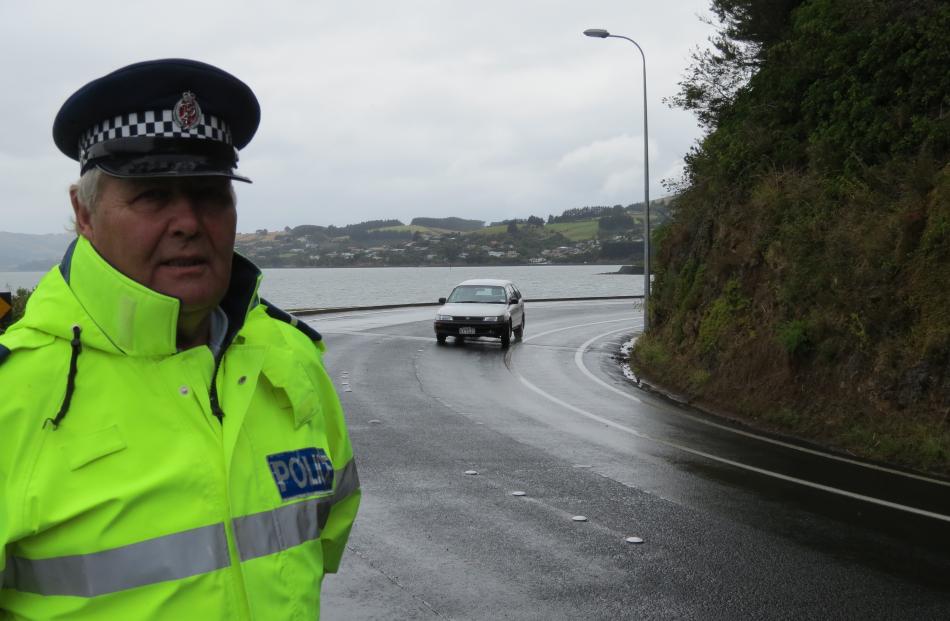 Senior Constable Lox Kellas, of Portobello, surveys a Portobello Rd corner that has been the site...