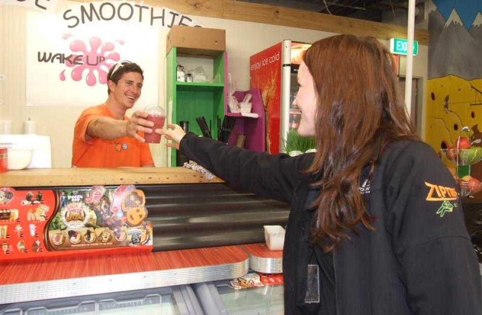 Shotover Markets vice manager Cam Cumming serves Nicole Sutherland, of Queenstown, a smoothie at...