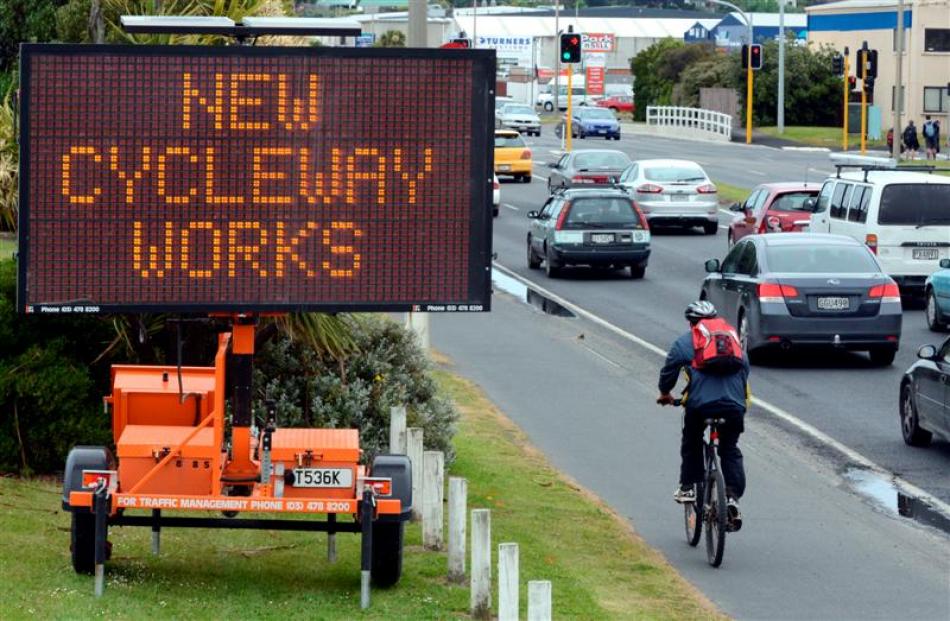 Signs anticipating cycleway construction appeared on Portsmouth Dr yesterday. Photo by Gerard O...