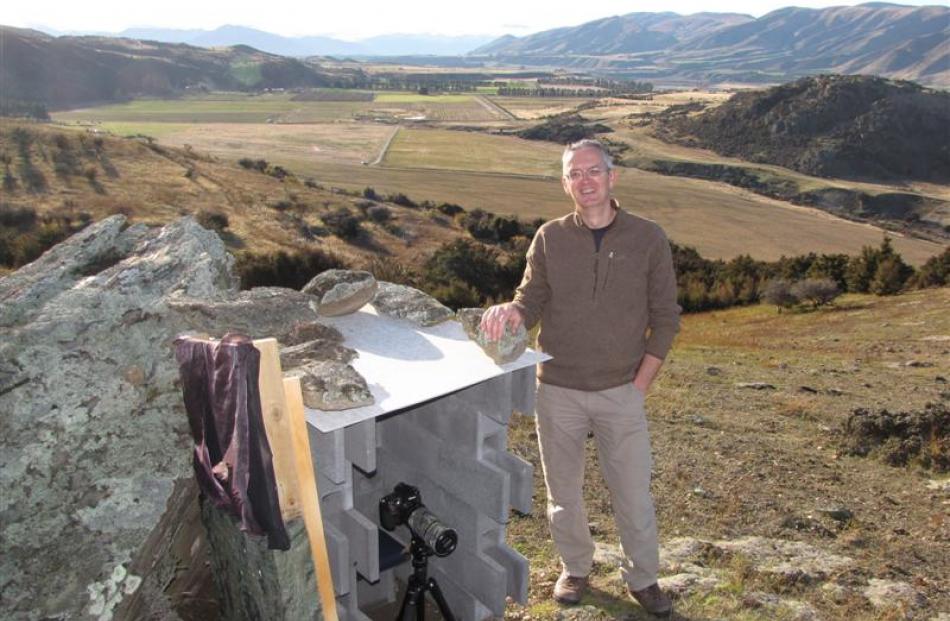 Simon Larkin with the small bird hide he built on his property high in the Queensberry hills to...