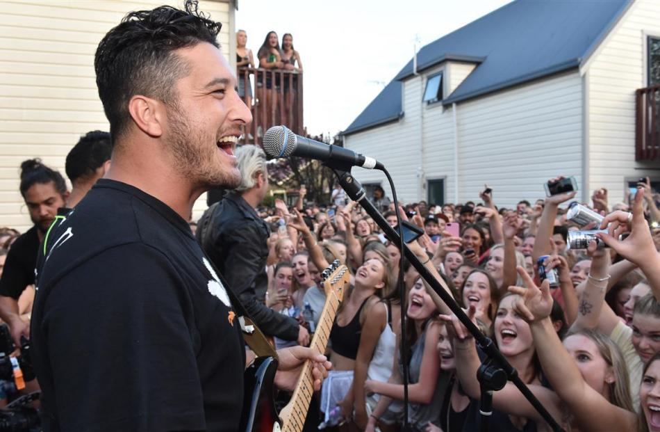 Six60 singer Matiu Walters entertains the crowd after the balcony collapse. Photos by Gregor...