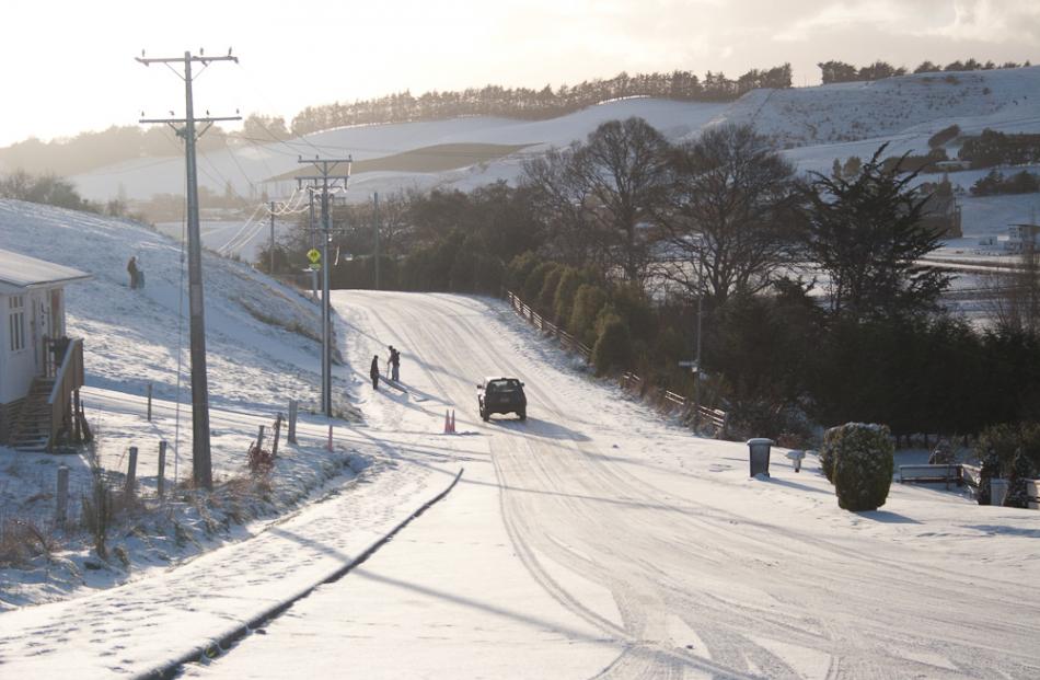 Snow made for quiet roads in Waikouaiti this morning. Photo Rob Mackintosh