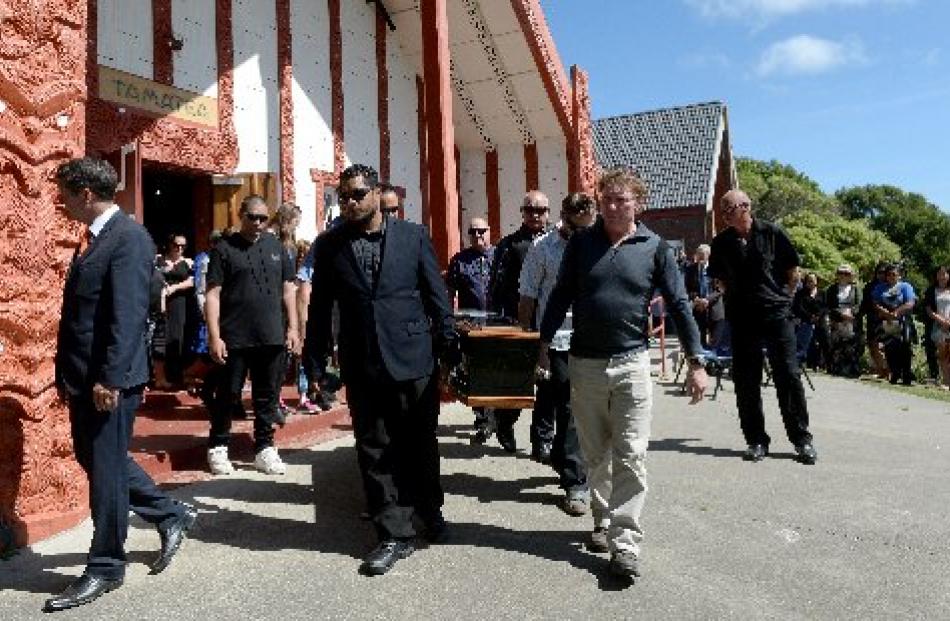 Solemn procession out of Te Whare Tamatea at a funeral at Otakou marae yesterday for Marty...