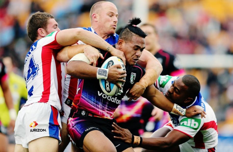 Solomone Kata of the Warriors on the charge during the round 12 NRL match between the New Zealand...