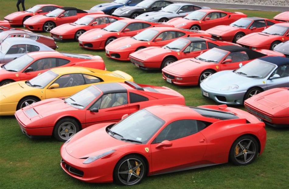 Some of the 50 Ferraris at the annual meeting of the Ferrari Owners Club of New Zealand parked...