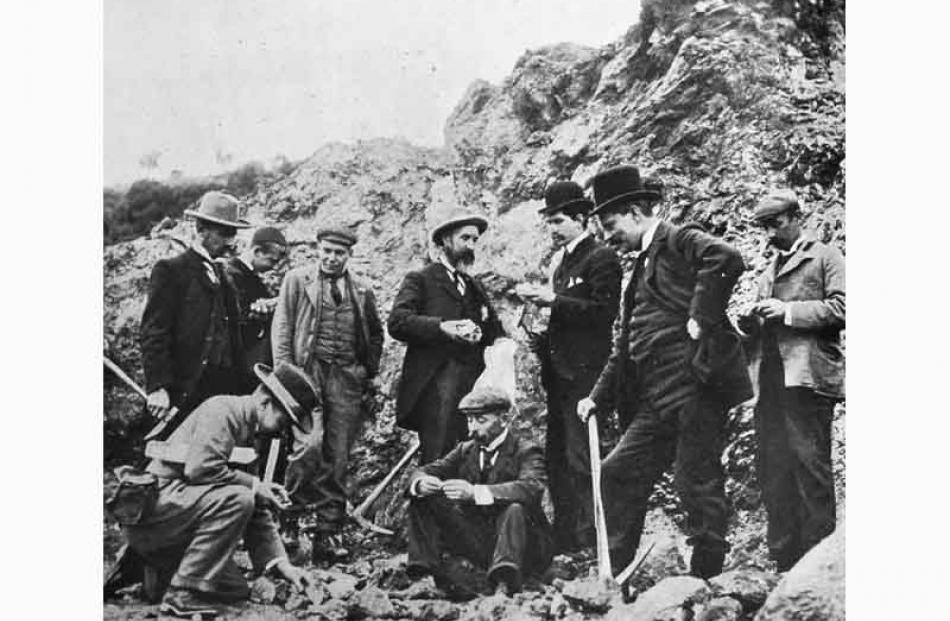 University of Otago School of Mines professors and students studying the rock in July 1902. Otago...