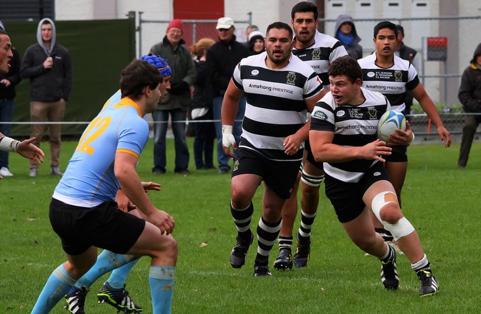 Southern Hooker Ricky Riccitelli drives the ball up for Southern in the early stages in the clash...