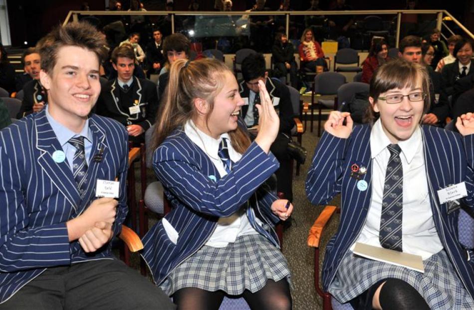 St Andrew's College (Christchurch) pupils (from left) Charles Reid, Isla Evison and Ellen Black ...