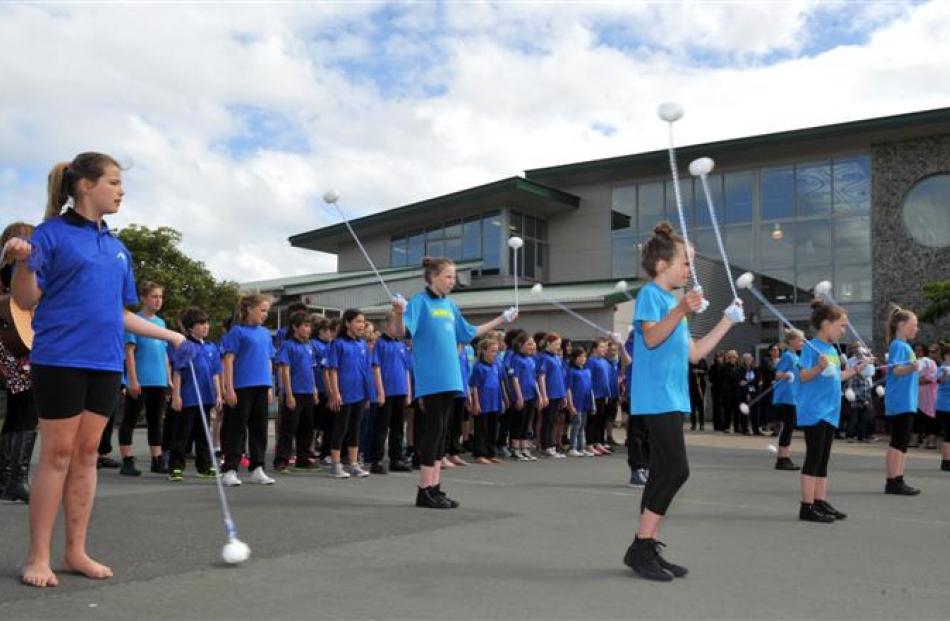 St Clair School pupils perform a powhiri for Education Minister Hekia Parata, who officially...
