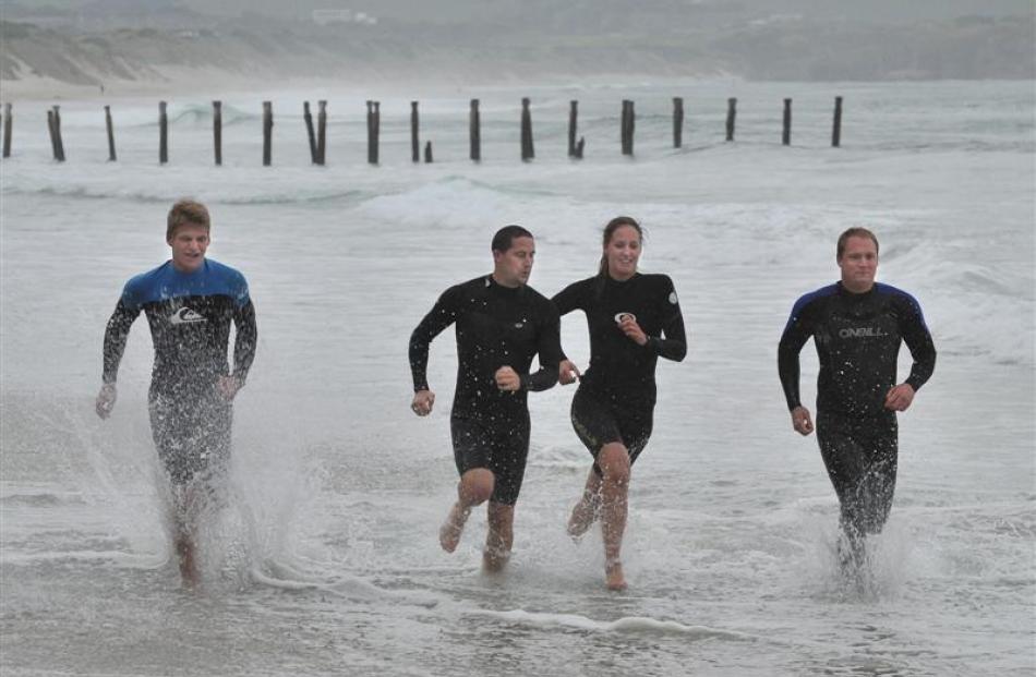 St Clair surf lifesavers train at St Clair yesterday (from left)  Angus Mackenzie (17), James...
