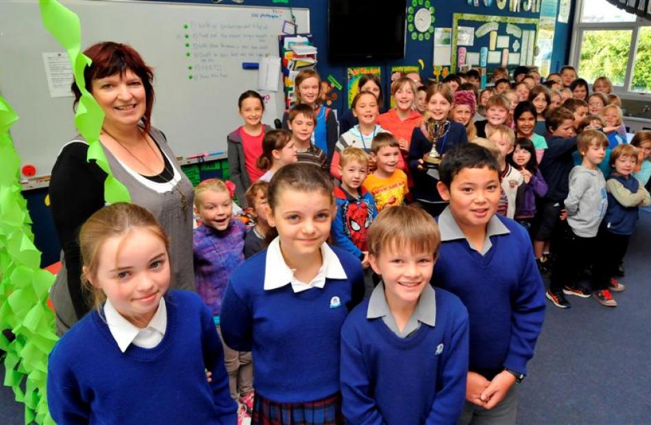 St Joseph's Cathedral School pupils (front, from left) Hermione Dryden, Stella Caulton, Ollie...