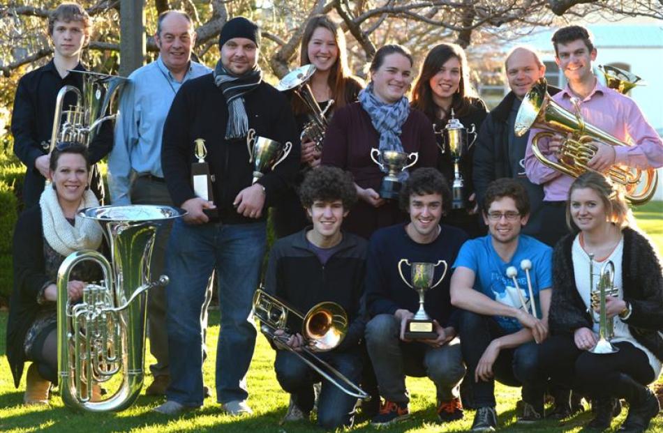 St Kilda Brass Band members (top from left) Harry Smith, Errol Moore, Steve Miles, Madeleine...